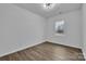 Clean bedroom featuring a new light fixture and luxury vinyl plank flooring at 2853 W Zion Church Rd, Shelby, NC 28150