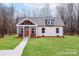 Charming craftsman-style home with a welcoming front porch and well-maintained lawn at 2853 W Zion Church Rd, Shelby, NC 28150