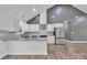 Modern kitchen with stainless steel appliances, sleek white cabinetry, and granite countertops at 2853 W Zion Church Rd, Shelby, NC 28150