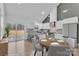 Bright modern kitchen features stainless appliances, a large island and seamlessly connects to the dining area at 2853 W Zion Church Rd, Shelby, NC 28150