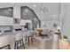 An open-concept living area featuring a modern kitchen with a large island and dining space at 2853 W Zion Church Rd, Shelby, NC 28150