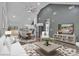 Open floor plan living area with vaulted ceilings, modern furnishings, seamlessly connecting living, dining, and kitchen at 2853 W Zion Church Rd, Shelby, NC 28150