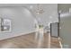 Open-concept space with vaulted ceilings, hardwood floors, and modern kitchen at 2853 W Zion Church Rd, Shelby, NC 28150