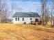 Home's backyard features a well-manicured lawn and wooden deck at 2855 W Zion Church Rd, Shelby, NC 28150