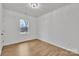 Cozy bedroom boasts hardwood floors, a well-lit window, and ample space for relaxation at 2855 W Zion Church Rd, Shelby, NC 28150