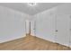 Bright bedroom with light-colored walls, wood-look floors, and a modern ceiling light at 2855 W Zion Church Rd, Shelby, NC 28150