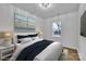 This bedroom features cozy decor, natural lighting, and a large window at 2855 W Zion Church Rd, Shelby, NC 28150