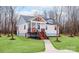 Charming home showcasing a welcoming front porch and manicured lawn at 2855 W Zion Church Rd, Shelby, NC 28150