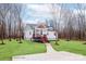 Charming home featuring a well-manicured lawn, inviting porch, and stylish exterior accents at 2855 W Zion Church Rd, Shelby, NC 28150