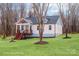 Charming home featuring a well-manicured lawn, inviting porch, and stylish exterior accents at 2855 W Zion Church Rd, Shelby, NC 28150