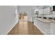 Bright kitchen features granite countertops, an undermount sink, and a sliding glass door leading to the backyard at 2855 W Zion Church Rd, Shelby, NC 28150