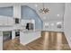 Bright open-concept kitchen with white cabinets, modern appliances, and a large center island at 2855 W Zion Church Rd, Shelby, NC 28150
