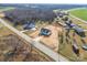 Aerial view of the home surrounded by trees and a road nearby at 2867 W Zion Church Rd, Shelby, NC 28150