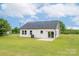 Spacious backyard featuring a concrete patio and plenty of room for activities and entertainment at 2867 W Zion Church Rd, Shelby, NC 28150