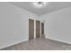 Bright bedroom features gray vinyl floors and a modern light fixture at 2867 W Zion Church Rd, Shelby, NC 28150