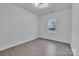 Bright bedroom boasts wood-look flooring and a large window overlooking the property at 2867 W Zion Church Rd, Shelby, NC 28150