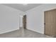 Neutral guest bedroom with wood-look flooring and access to a hallway at 2867 W Zion Church Rd, Shelby, NC 28150