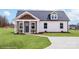 Charming single-story home features a welcoming front porch, neatly landscaped yard, and a gray-shingled roof at 2867 W Zion Church Rd, Shelby, NC 28150