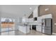 Bright kitchen with stainless steel appliances and a large sliding glass door at 2867 W Zion Church Rd, Shelby, NC 28150