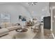 Bright, open-concept living room with modern finishes and seamlessly connected dining and kitchen areas at 2867 W Zion Church Rd, Shelby, NC 28150