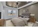 Serene main bedroom with a tray ceiling, natural light, neutral colors, and modern furniture for a relaxing retreat at 2867 W Zion Church Rd, Shelby, NC 28150