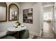Cozy breakfast nook featuring a marble table, booth seating, and stylish decor at 3020 Finchborough Ct # 230, Charlotte, NC 28269