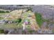 Aerial view of property with pool, house and other outbuildings at 3427 Joe Johnson Rd, Catawba, NC 28609