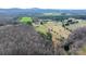 Scenic aerial view showcasing the property's sprawling landscape and surrounding natural beauty at 3427 Joe Johnson Rd, Catawba, NC 28609