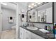 Bright bathroom featuring vanity with ample counter space, large mirror and a toilet at 3427 Joe Johnson Rd, Catawba, NC 28609