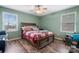 Bedroom with a bed, hardwood floors, ceiling fan and a window bringing in light at 3427 Joe Johnson Rd, Catawba, NC 28609