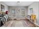 Bright bonus room with hardwood floors, large windows, and a charming decorative easel at 3427 Joe Johnson Rd, Catawba, NC 28609
