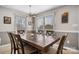 Charming dining room with natural light, a rustic table, and seating for six at 3427 Joe Johnson Rd, Catawba, NC 28609