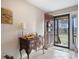Inviting foyer featuring tiled floors, wooden table, and a view of the outdoors at 3427 Joe Johnson Rd, Catawba, NC 28609