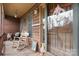 Inviting front porch with rocking chair and seasonal decorations, exuding a warm and welcoming ambiance at 3427 Joe Johnson Rd, Catawba, NC 28609