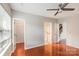 Spacious bedroom with walk-in closet and a view of the staircase and bathroom at 3610 Melrose Cottage Dr, Matthews, NC 28105