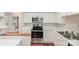 Modern kitchen featuring stainless steel appliances and white cabinetry at 3610 Melrose Cottage Dr, Matthews, NC 28105
