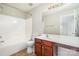 Bathroom with a large mirror, vanity and a shower-tub combination at 3822 Carl Parmer Dr, Harrisburg, NC 28075