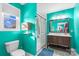 Bathroom featuring teal walls, a tiled floor, and a glass door shower at 41 Fleetwood Sw Dr # 44, Concord, NC 28027