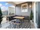 Cozy back porch with outdoor seating and patterned rug at 416 Clemson Tree Ln, Lake Wylie, SC 29710