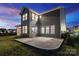 Backyard with a concrete patio, perfect for outdoor dining and entertaining at 416 Clemson Tree Ln, Lake Wylie, SC 29710