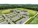 Aerial view of well-maintained baseball fields featuring green outfields and landscaped parking areas at 416 Clemson Tree Ln, Lake Wylie, SC 29710