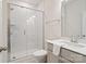 Modern bathroom with a glass-enclosed shower, white subway tile, and a sleek vanity at 416 Clemson Tree Ln, Lake Wylie, SC 29710