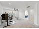 Large bonus room with neutral carpet, a ceiling fan, and plenty of natural light at 416 Clemson Tree Ln, Lake Wylie, SC 29710