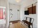 Inviting foyer features a bench, textured rug, and stylish wall decor at 416 Clemson Tree Ln, Lake Wylie, SC 29710