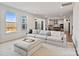 Spacious living room with large windows, plush seating, and an open layout at 416 Clemson Tree Ln, Lake Wylie, SC 29710