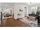 Open-concept living room with stylish furnishings and hardwood floors at 416 Clemson Tree Ln, Lake Wylie, SC 29710