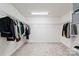 Spacious walk-in closet featuring wire shelving and ample storage space for an organized wardrobe at 416 Clemson Tree Ln, Lake Wylie, SC 29710