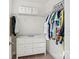 Walk-in closet features a dresser, white walls, wire shelving, and carpet floors at 416 Clemson Tree Ln, Lake Wylie, SC 29710