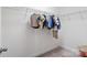 Bright walk-in closet with white walls, shelving, and carpet floors for storage at 416 Clemson Tree Ln, Lake Wylie, SC 29710
