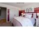 Bedroom featuring a playful wall design, rainbow decor, and a double door closet at 4688 Glen Stripe Dr # Cal0069, Indian Trail, NC 28079